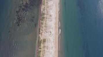 View from a drone vertically down at dawn to the Nazimov sand spit, Russia video