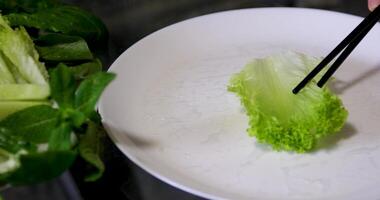 spring rolls making process step by step Spring roll with chicken or shrimps in rice paper with sweet and sour sauce close-up, cooking traditional korean chinese food. Tasty vietnamese cuisine. video
