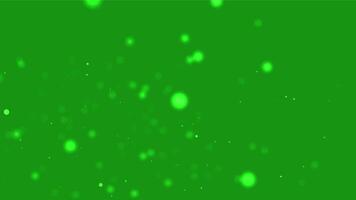 light bokeh particles on green screen background, A vibrant green screen backdrop featuring numerous small, light-green bokeh particles. video