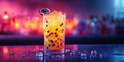 Refreshing tropical cocktail with vibrant colors and ice in a lively bar setting at night photo