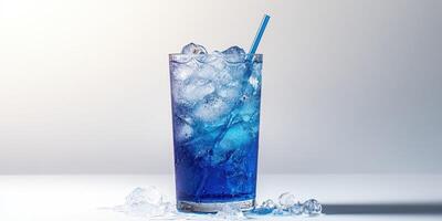 Refreshing blue drink served in a tall glass filled with ice for a summer afternoon experience photo
