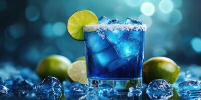 Refreshing blue cocktail garnished with lime on ice in a vibrant setting photo