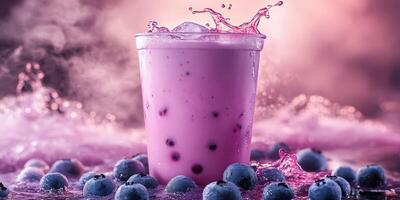 Vibrant blueberry bubble drink splashes with ice and vibrant colors in a creative setting photo