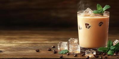 Iced coffee drink with ice cubes and mint on wooden table in cozy setting during warm afternoon photo