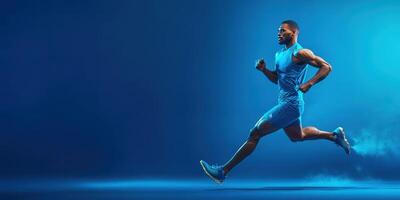 Athlete sprinting at high speed in a dynamic pose on a vibrant blue background during a fitness session photo