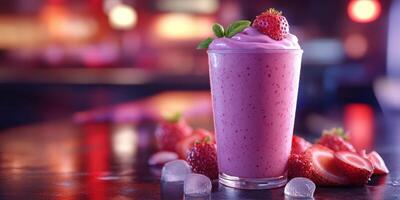 Refreshing strawberry smoothie served with fresh strawberries and ice cubes in a vibrant setting photo