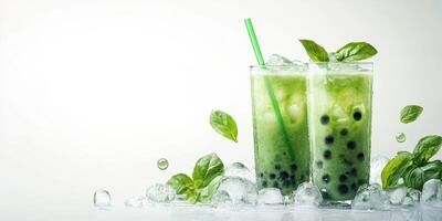 Refreshing basil and green tea drinks served on ice in a cool setting during a summer day photo