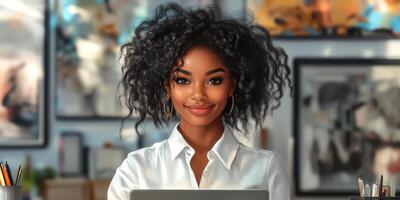 Portrait of a smiling woman with curly hair in a bright workspace surrounded by art and creativity photo