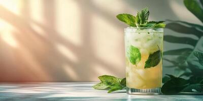 Refreshing mint cocktail with crushed ice and fresh leaves in a sunny setting photo