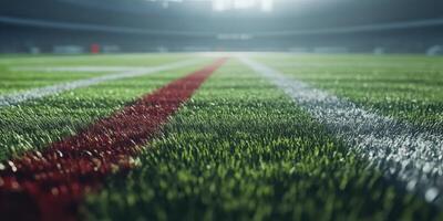 Close view of a vibrant football field during an evening match, showcasing bright grass and clear markings photo