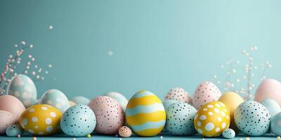 Colorful pastel Easter eggs arranged on a blue background with delicate decorative elements for spring celebrations photo