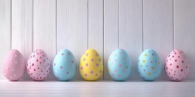 Colorful decorative eggs lined up against a white wooden background in a festive spring setting photo