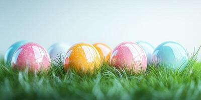Colorful Easter eggs arranged in fresh green grass on a bright spring day photo