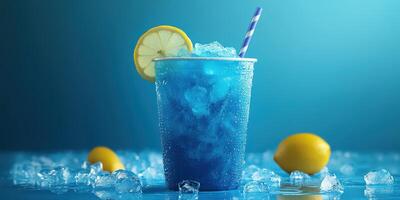 Refreshing blue beverage with lemon slice on ice against a vibrant blue background photo