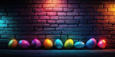 Colorful decorated eggs arranged in a row against a vibrant brick wall in a dimly lit setting photo