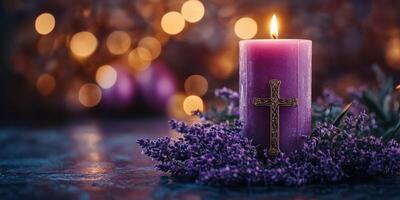 Purple candle with cross surrounded by lavender blooms and soft bokeh lights at evening gathering photo