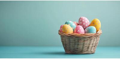 Colorful Easter eggs in a wicker basket on a blue background for spring celebration photo