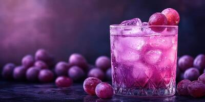 Refreshing grape drink with ice and fresh grapes on a dark surface in a moody atmosphere photo