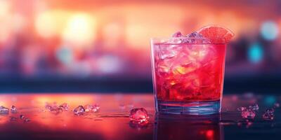 Refreshing cocktail served in a glass with ice and a slice of citrus fruit at a lively bar during evening hours photo