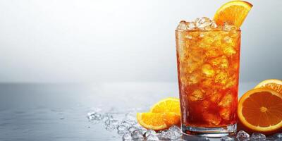 Refreshing iced beverage served with orange slices on a shiny surface, perfect for warm days or celebrations photo