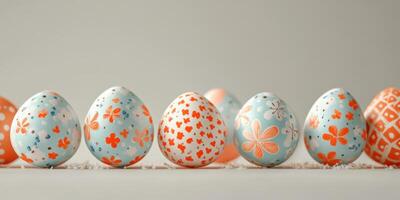 Colorful decorated eggs line up on a neutral surface for spring celebration and holiday activities photo