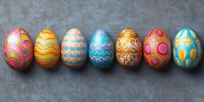 Colorful decorated eggs arranged in a line for a festive spring celebration photo