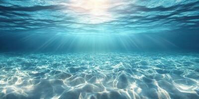 Sunlight filtering through crystal clear water creates a serene underwater scene photo