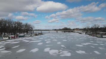 A frozen lake with snow and ice on it video