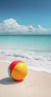 colorful beach ball rests on white sandy shore, with gentle waves lapping at beach under bright blue sky photo