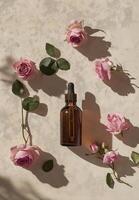 brown glass dropper bottle surrounded by pink roses on textured surface, creating serene and elegant atmosphere photo