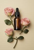 amber dropper bottle of face oil surrounded by pink roses, creating serene and elegant atmosphere photo