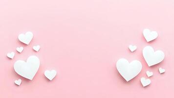 Modern minimalist Valentine Day background with paper hearts photo