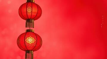 Bright Red Background with Two Traditional Chinese Lanterns photo