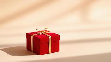 Luxurious red gift box with delicate bow on clean backdrop photo