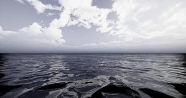 Serene waters under a cloudy sky at twilight hours video
