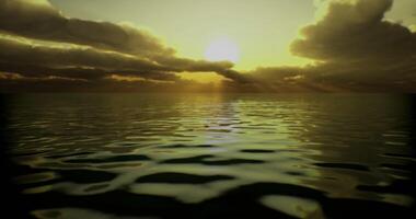 Beautiful sunset view over calm ocean waters with soft clouds video