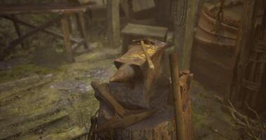 Detailed view of an old anvil in a rustic workshop with various tools video