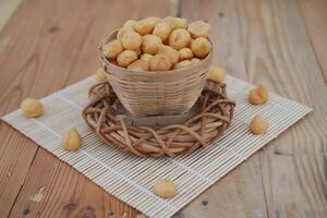 Golden Crispy Snacks in a Bamboo Basket photo
