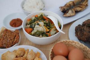 Authentic Indonesian Cuisine Beautifully Arranged on a Table photo