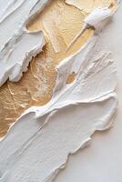 Richly textured acrylic brushstrokes blend white with layers of metallic gold, silver, and bronze, creating a tactile and sophisticated visual identity for premium products photo