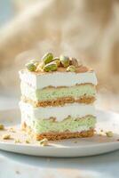 A beautifully crafted multi-layered pistachio tiramisu rises elegantly, showcasing its unique layers and textures in a soft golden atmosphere, inviting a delightful tasting experience photo