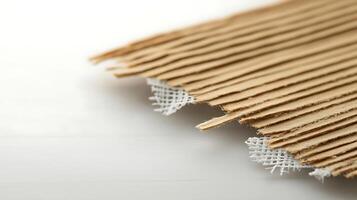 Close-up view of textured cardboard with white fabric edges on a light background photo