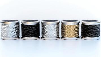 Collection of decorative candle holders in various colors displayed on a clean, bright surface photo