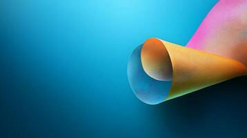 Colorful abstract paper curl on a smooth blue background showcasing vibrant hues and texture photo