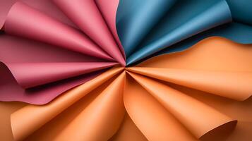 Colorful arrangement of textured paper sheets in a circular pattern showcasing vibrant hues photo