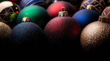 Colorful assortment of Christmas ornaments arranged closely, featuring various textures and designs photo