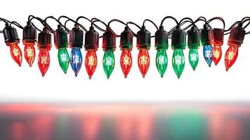 Colorful Christmas lights hanging in a row, reflecting on a smooth surface with a bright background photo