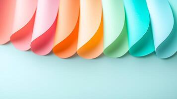 Colorful curved paper sheets arranged in waves on a light background for creative projects photo