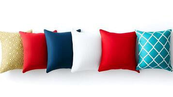 Colorful decorative pillows arranged in a row on a bright background, showcasing various patterns photo