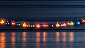 Colorful decorative lights hanging in a festive setting with reflections on a smooth surface photo